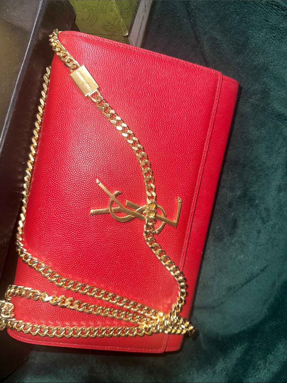 Saint Laurent Red Pebble Leather Mini Bag with Gold Chain Accent